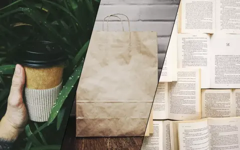 Kubek z kawy z papieru, torba na zakupy z eko papieru i otwarte książki.