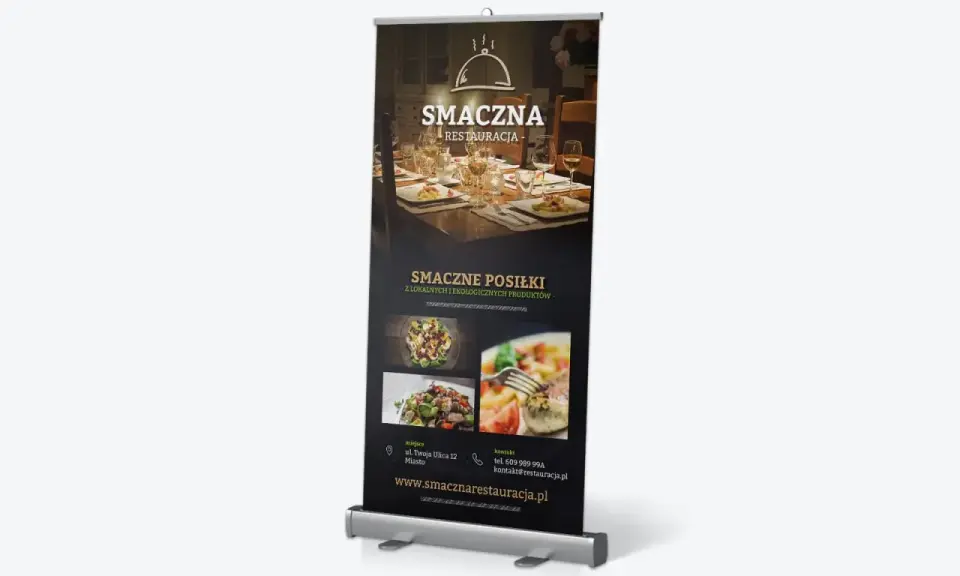 Projekt roll upu restauracji "Smaczna". Reklama promuje smaczne posiłki z lokalnych i ekologicznych produktów.